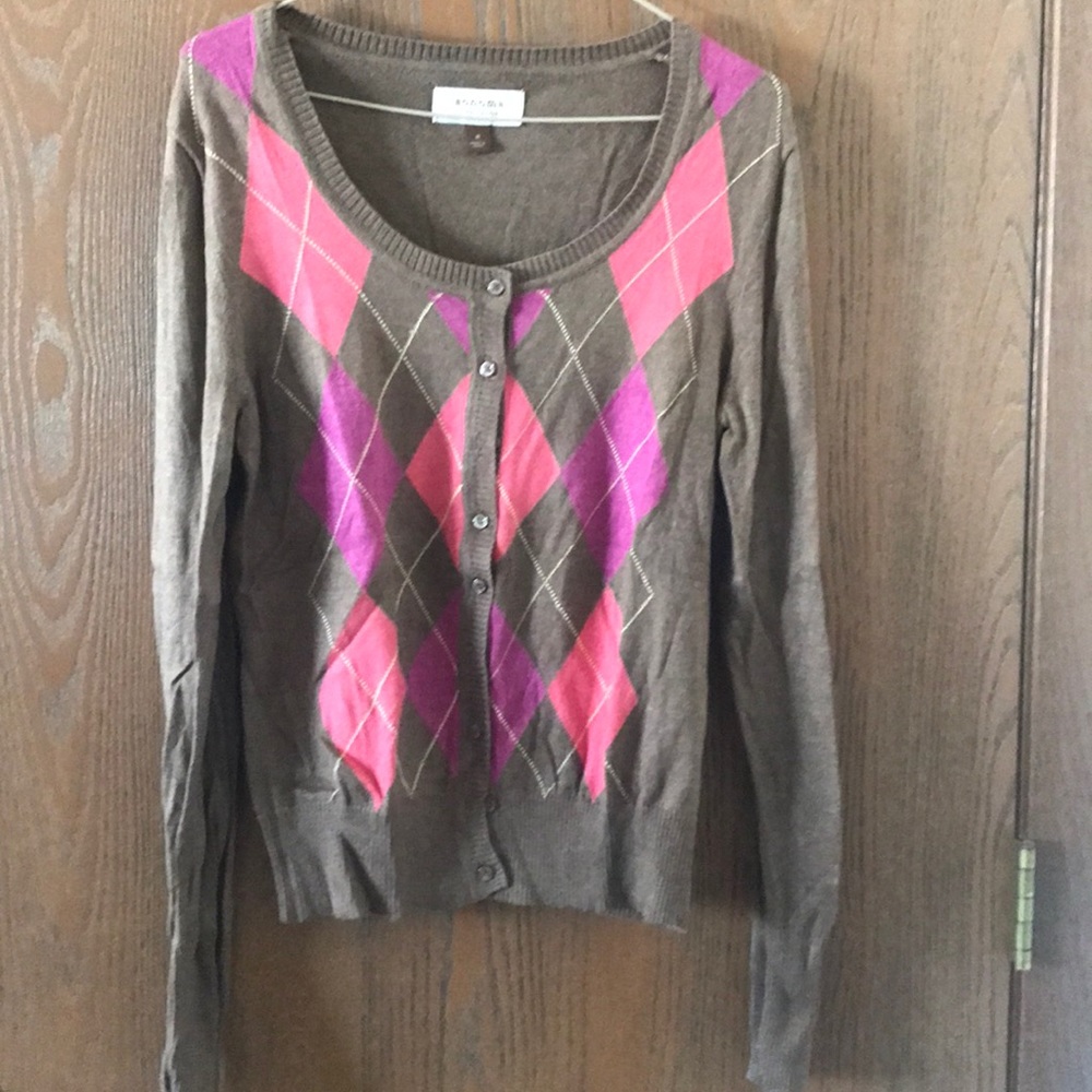 Brown and pink sweater.